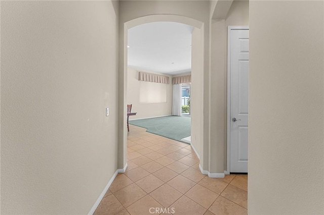 1790 N Forest Oaks Dr, Beaumont, CA 92223 - hall with arched walkways and light tile patterned floors