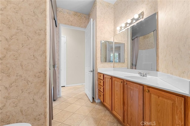 1790 N Forest Oaks Dr, Beaumont, CA 92223 - bathroom featuring tile patterned floors, vanity, wallpapered walls, and a shower
