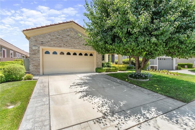 1790 N Forest Oaks Dr, Beaumont, CA 92223 - view of front of home featuring a garage, concrete driveway, a front yard, and stone siding