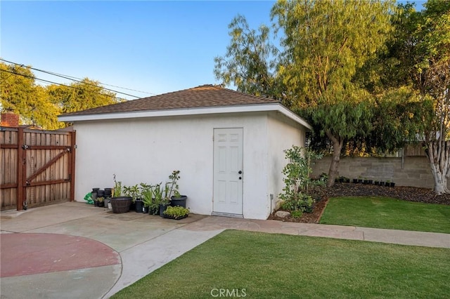 716 N Tulare Way, Upland, CA 91786 - view of outdoor structure featuring a fenced backyard and a gate