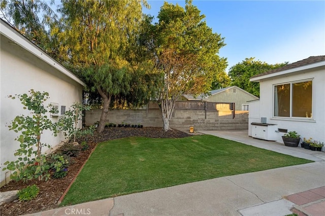 716 N Tulare Way, Upland, CA 91786 - fenced backyard with a patio area