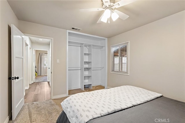 716 N Tulare Way, Upland, CA 91786 - carpeted bedroom with a closet and ceiling fan