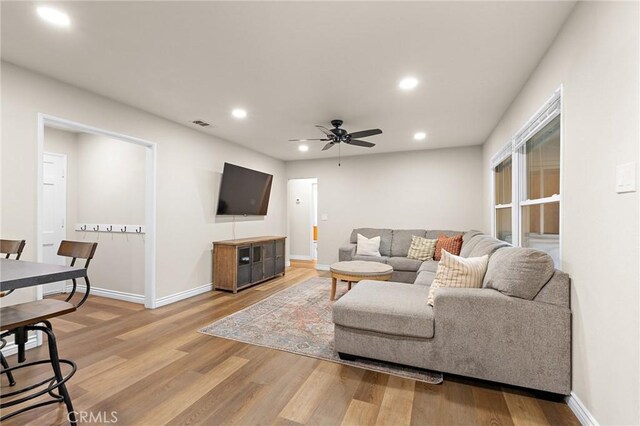716 N Tulare Way, Upland, CA 91786 - living area with recessed lighting, light wood-style flooring, and ceiling fan