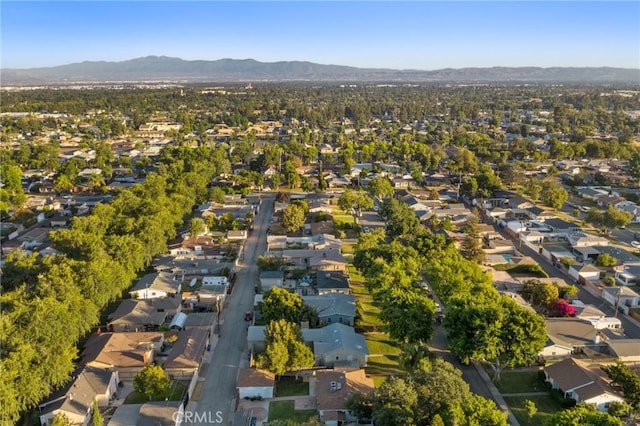 716 N Tulare Way, Upland, CA 91786 - aerial view of property and surrounding area featuring nearby suburban area and mountains