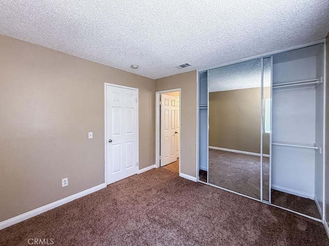 16702 Canoe Cv, Moreno Valley, CA 92551 - unfurnished bedroom featuring carpet floors, a textured ceiling, and a closet