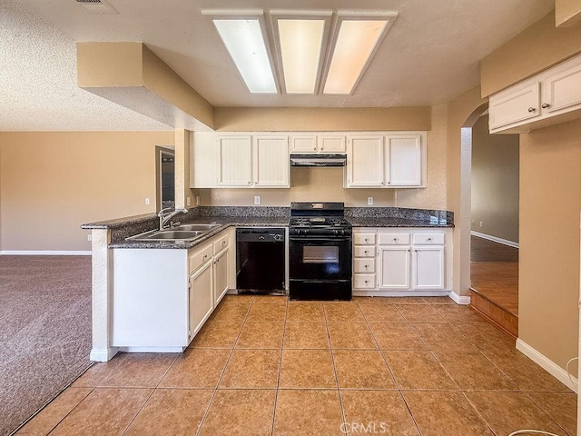 16702 Canoe Cv, Moreno Valley, CA 92551 - kitchen with black appliances, under cabinet range hood, white cabinets, and a peninsula
