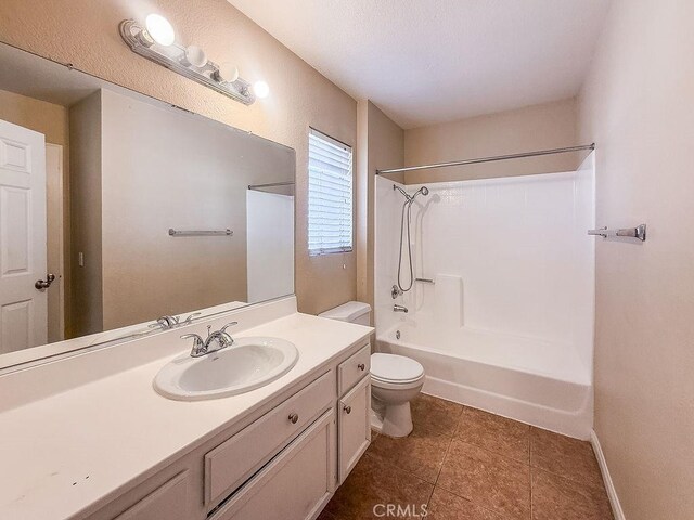 16702 Canoe Cv, Moreno Valley, CA 92551 - full bathroom featuring washtub / shower combination, vanity, and tile patterned floors