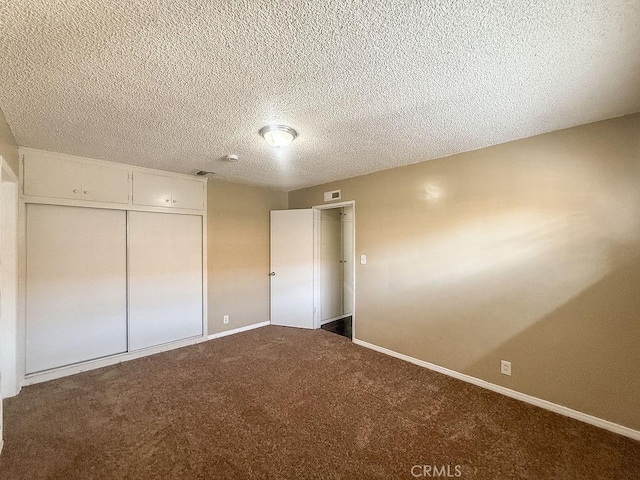 409 N Elwood Ave, Glendora, CA 91741 - unfurnished bedroom with carpet, a textured ceiling, and a closet