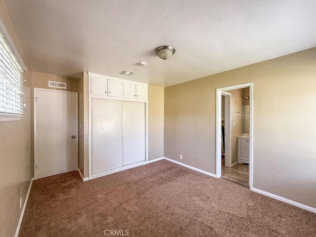 409 N Elwood Ave, Glendora, CA 91741 - unfurnished bedroom featuring carpet, a closet, and ensuite bathroom