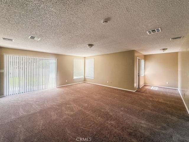 409 N Elwood Ave, Glendora, CA 91741 - carpeted empty room featuring a textured ceiling and a smoke detector