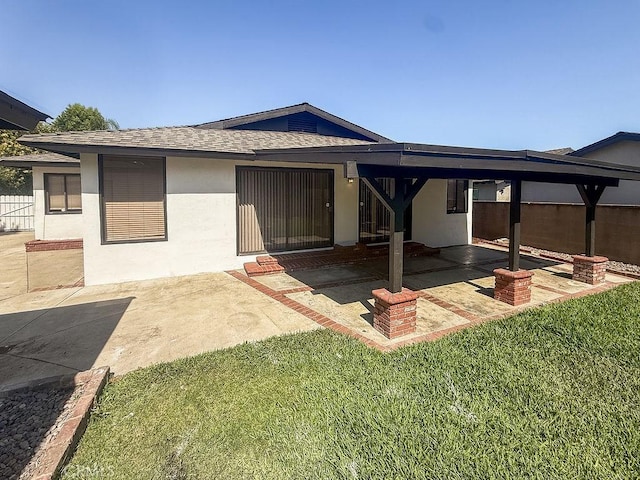 409 N Elwood Ave, Glendora, CA 91741 - rear view of house with stucco siding, a patio area, and a shingled roof