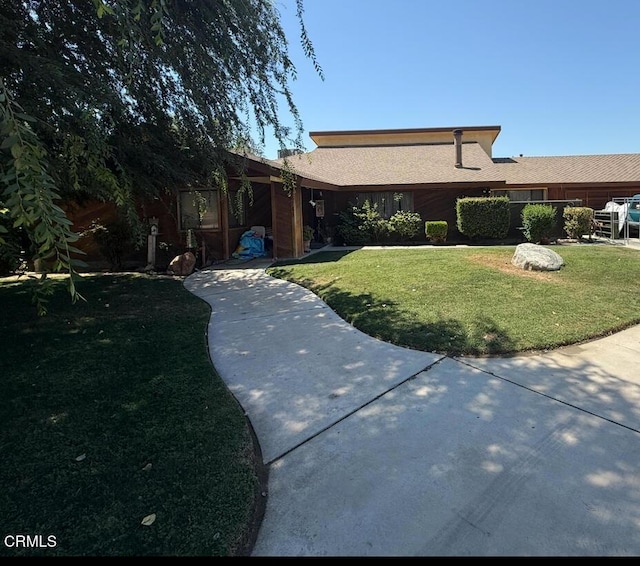 16745 Stephenie St, Bakersfield, CA 93314 - view of front of house with a front lawn and a patio area