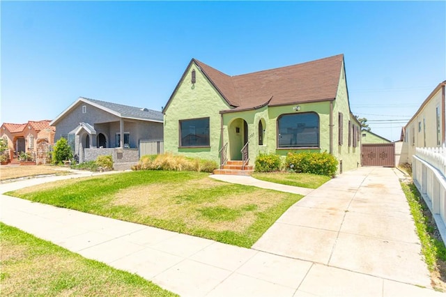 2027 W 70th St, Los Angeles, CA 90047 - view of front of home featuring stucco siding