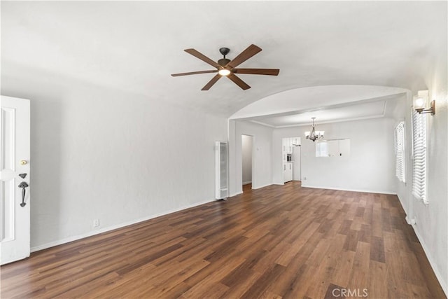 2027 W 70th St, Los Angeles, CA 90047 - unfurnished living room featuring a chandelier, ceiling fan, wood finished floors, and a heating unit