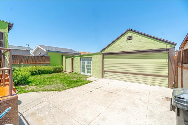 2027 W 70th St, Los Angeles, CA 90047 - garage with french doors and driveway