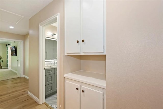 2287 Kemper Ave, Claremont, CA 91711 - hallway featuring light wood finished floors and recessed lighting