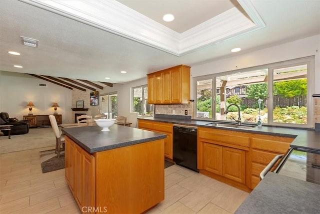 2287 Kemper Ave, Claremont, CA 91711 - kitchen featuring black dishwasher, dark countertops, a kitchen island, recessed lighting, and open floor plan