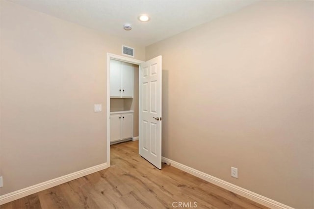 2287 Kemper Ave, Claremont, CA 91711 - spare room with light wood finished floors, recessed lighting, and a smoke detector