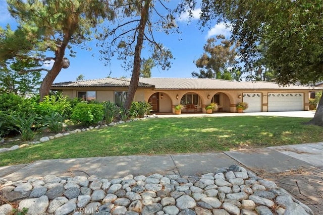 2287 Kemper Ave, Claremont, CA 91711 - ranch-style home with a front yard, stucco siding, a garage, a tile roof, and concrete driveway