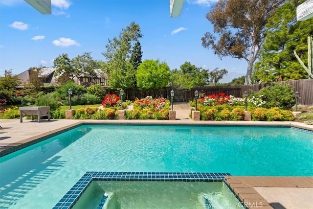 2287 Kemper Ave, Claremont, CA 91711 - view of pool with a fenced backyard, a pool with connected hot tub, and a patio area