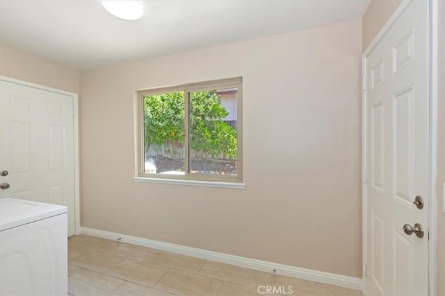 2287 Kemper Ave, Claremont, CA 91711 - laundry area with washer / dryer and light tile patterned flooring