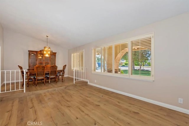 2287 Kemper Ave, Claremont, CA 91711 - dining space with plenty of natural light, wood finished floors, and lofted ceiling
