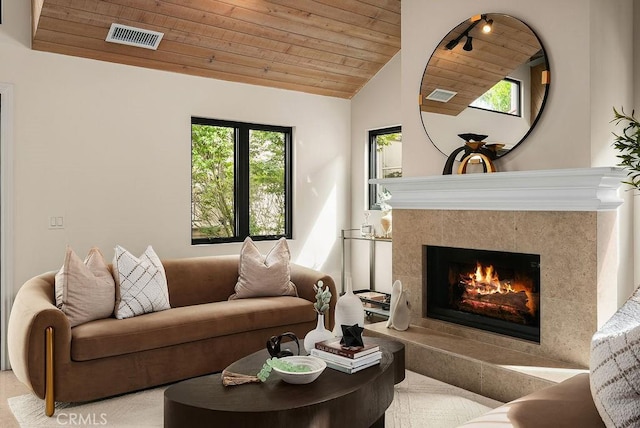 4411/2 Goldenrod Ave, Corona Del Mar, CA 92625 - living area with wooden ceiling, lofted ceiling, and a premium fireplace