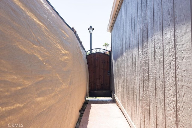 700 E Washington St Unit 143, Colton, CA 92324 - view of side of property with a gate