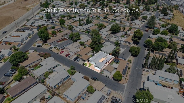 700 E Washington St Unit 143, Colton, CA 92324 - aerial view of property and surrounding area featuring nearby suburban area