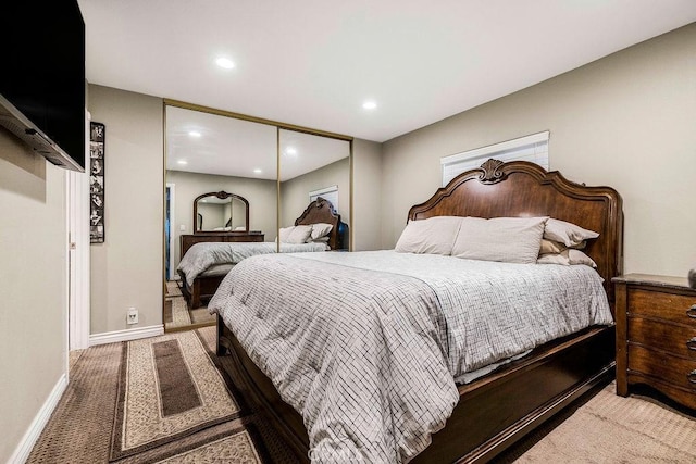 700 E Washington St Unit 143, Colton, CA 92324 - bedroom with recessed lighting, a closet, and carpet flooring