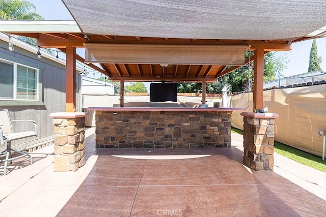 700 E Washington St Unit 143, Colton, CA 92324 - fenced backyard with a patio area