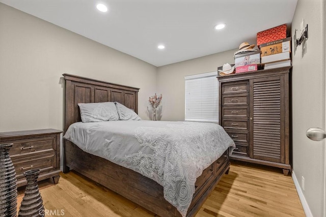 700 E Washington St Unit 143, Colton, CA 92324 - bedroom with light wood finished floors and recessed lighting