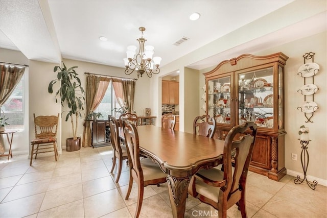 19247 Mountain Shadow Ln, Perris, CA 92570 - dining room with a chandelier, light tile patterned floors, and recessed lighting