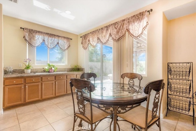 19247 Mountain Shadow Ln, Perris, CA 92570 - dining space featuring plenty of natural light and light tile patterned floors