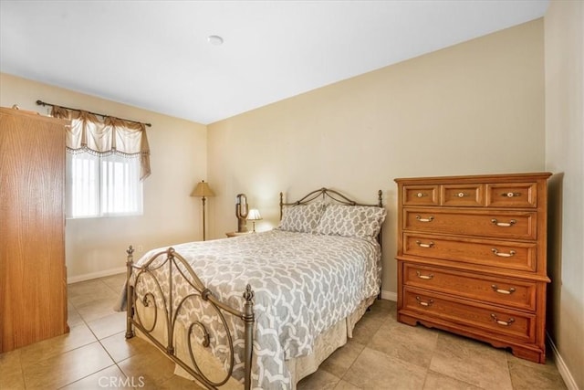 19247 Mountain Shadow Ln, Perris, CA 92570 - bedroom featuring light tile patterned flooring and baseboards