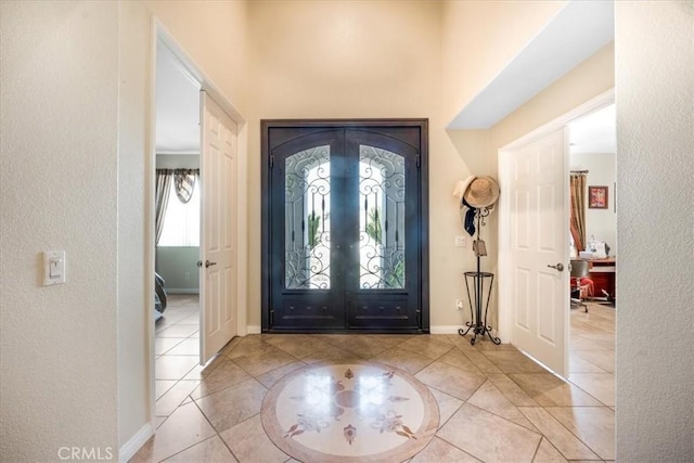 19247 Mountain Shadow Ln, Perris, CA 92570 - foyer entrance with light tile patterned floors and french doors