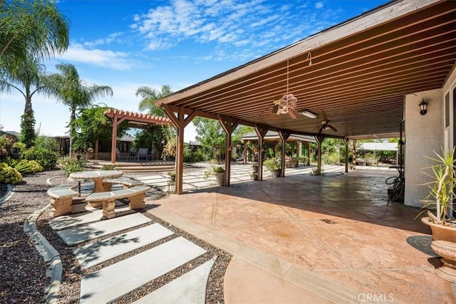 19247 Mountain Shadow Ln, Perris, CA 92570 - view of patio featuring a pergola