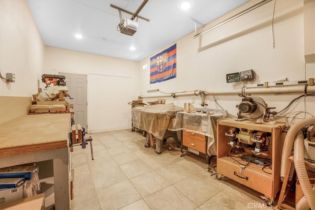 19247 Mountain Shadow Ln, Perris, CA 92570 - miscellaneous room featuring a garage, a workshop area, and tile patterned floors