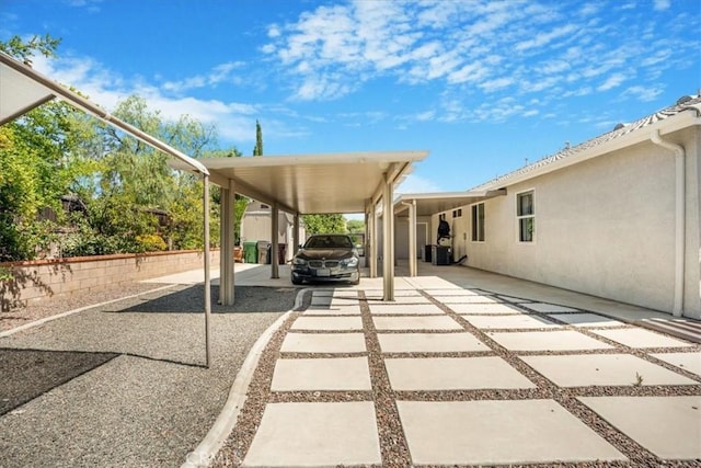 19247 Mountain Shadow Ln, Perris, CA 92570 - view of patio / terrace with an attached carport