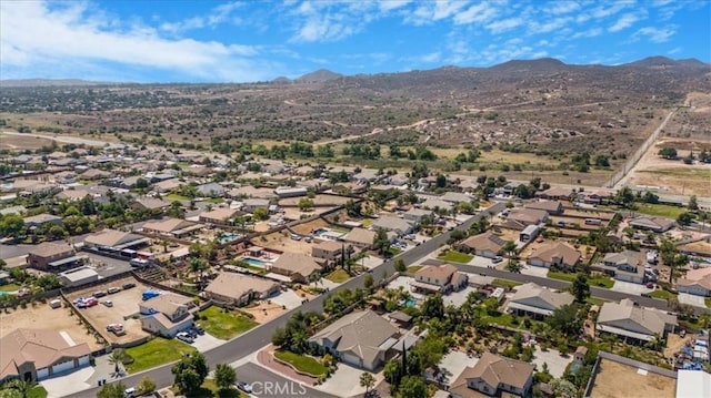 19247 Mountain Shadow Ln, Perris, CA 92570 - aerial perspective of suburban area with a mountainous background