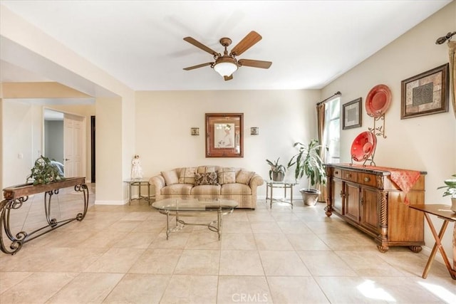 19247 Mountain Shadow Ln, Perris, CA 92570 - living area with ceiling fan and light tile patterned floors