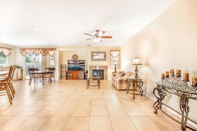 19247 Mountain Shadow Ln, Perris, CA 92570 - tiled living area featuring ceiling fan and a premium fireplace
