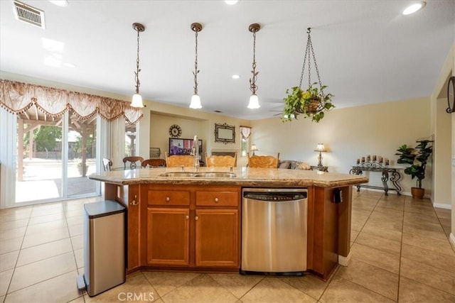 19247 Mountain Shadow Ln, Perris, CA 92570 - kitchen featuring dishwasher, light tile patterned floors, brown cabinets, hanging light fixtures, and recessed lighting