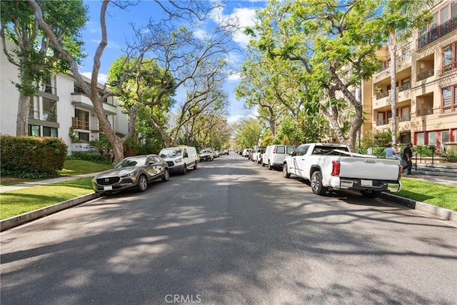 411 N Oakhurst Dr Unit 201, Beverly Hills, CA 90210 - view of asphalt street with curbs and sidewalks