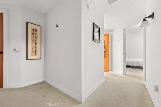 411 N Oakhurst Dr Unit 201, Beverly Hills, CA 90210 - hall with carpet floors and baseboards