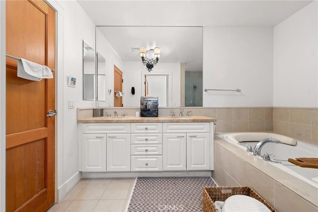 411 N Oakhurst Dr Unit 201, Beverly Hills, CA 90210 - full bath with tile patterned flooring, a garden tub, double vanity, and a tile shower