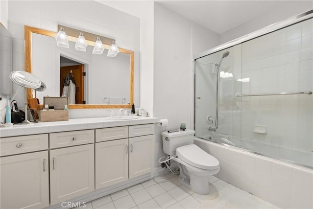 411 N Oakhurst Dr Unit 201, Beverly Hills, CA 90210 - full bathroom with tile patterned floors, tiled shower / bath combo, and vanity