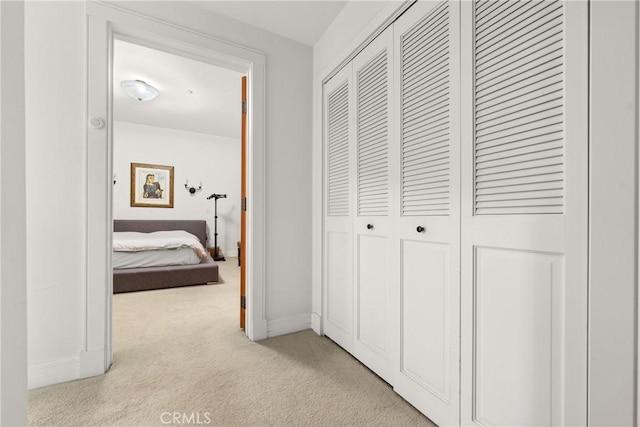411 N Oakhurst Dr Unit 201, Beverly Hills, CA 90210 - hall featuring light carpet and baseboards