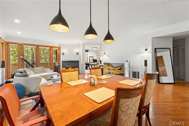 411 N Oakhurst Dr Unit 201, Beverly Hills, CA 90210 - dining area with wood finished floors and recessed lighting