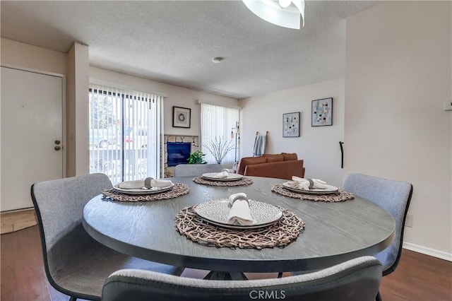 7302 Bright Ave Unit B, Whittier, CA 90602 - dining room featuring wood finished floors and a textured ceiling